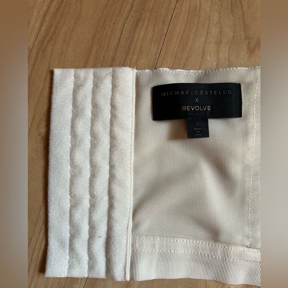 x REVOLVE Kylen Midi Dress in Ivory
Michael Costello - Picture 9 of 10